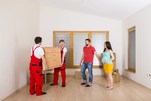 Packed boxes and household items ready for a New Addington flat relocation