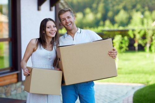 Careful loading of furniture and boxes for a flat move in New Addington