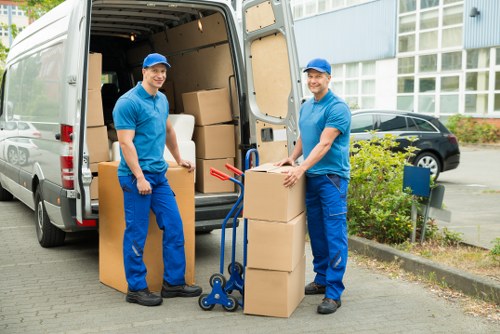 Removal team loading student furniture for a New Addington move