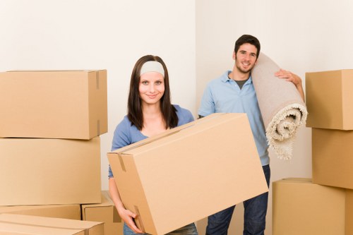 Packed office boxes and business equipment prepared for relocation