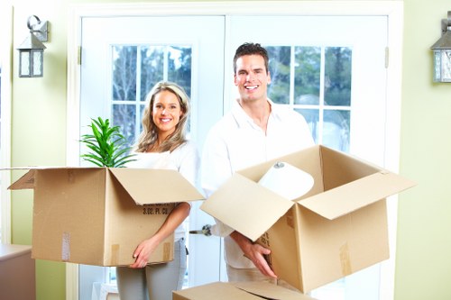 Professional man and van Newaddington moving furniture and boxes locally