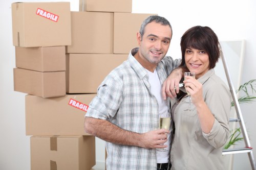 Careful loading of sofas and bulky household furniture into a removals van